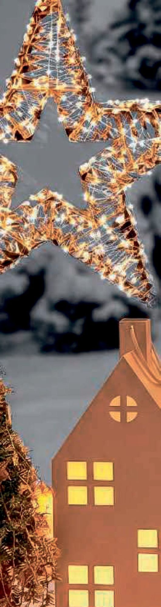 Beleuchteter LED-Stern aus Metall mit warmweissen Lichtern am Fenster