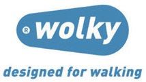 Logo der Schuhmarke wolky mit Zusatz designed for walking in Blau